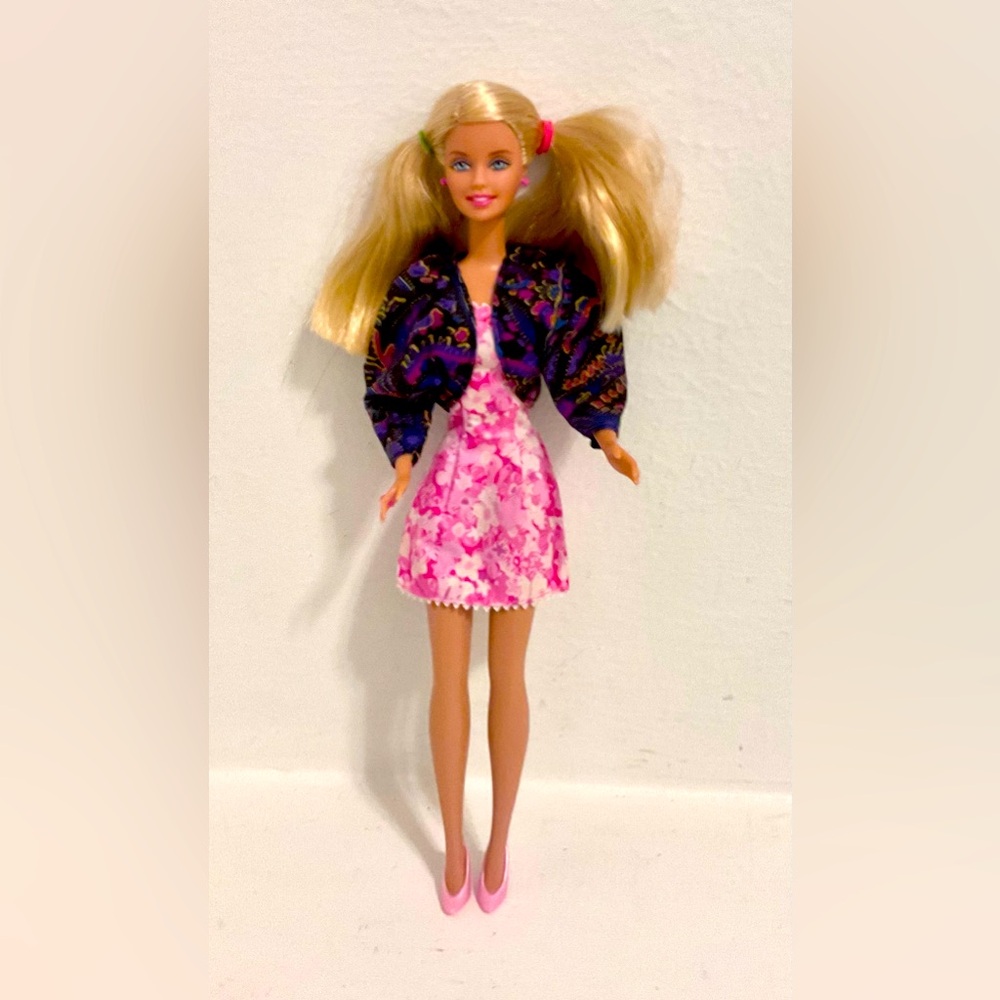 Barbie 1966 Mattel, Inc. Indonesia in a pink dress and jacket.